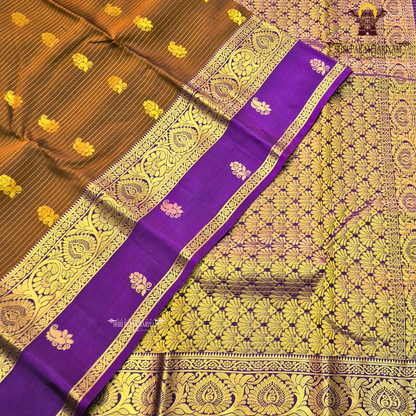Rich coffee brown body with royal purple contrast pallu and antique gold zari Saree