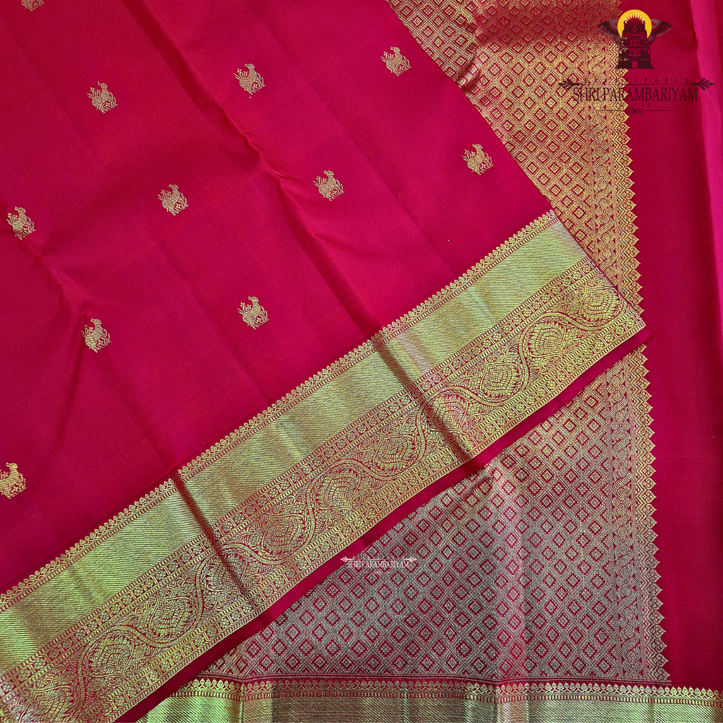 A rich bright vermilion red Saree