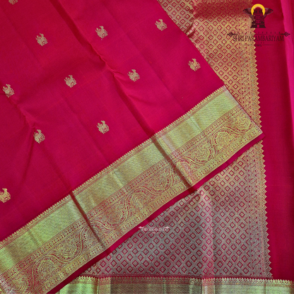 A rich bright vermilion red Saree