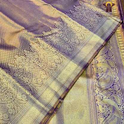 A rich Golden Tissue base with a soft Purple (Violet) border Saree