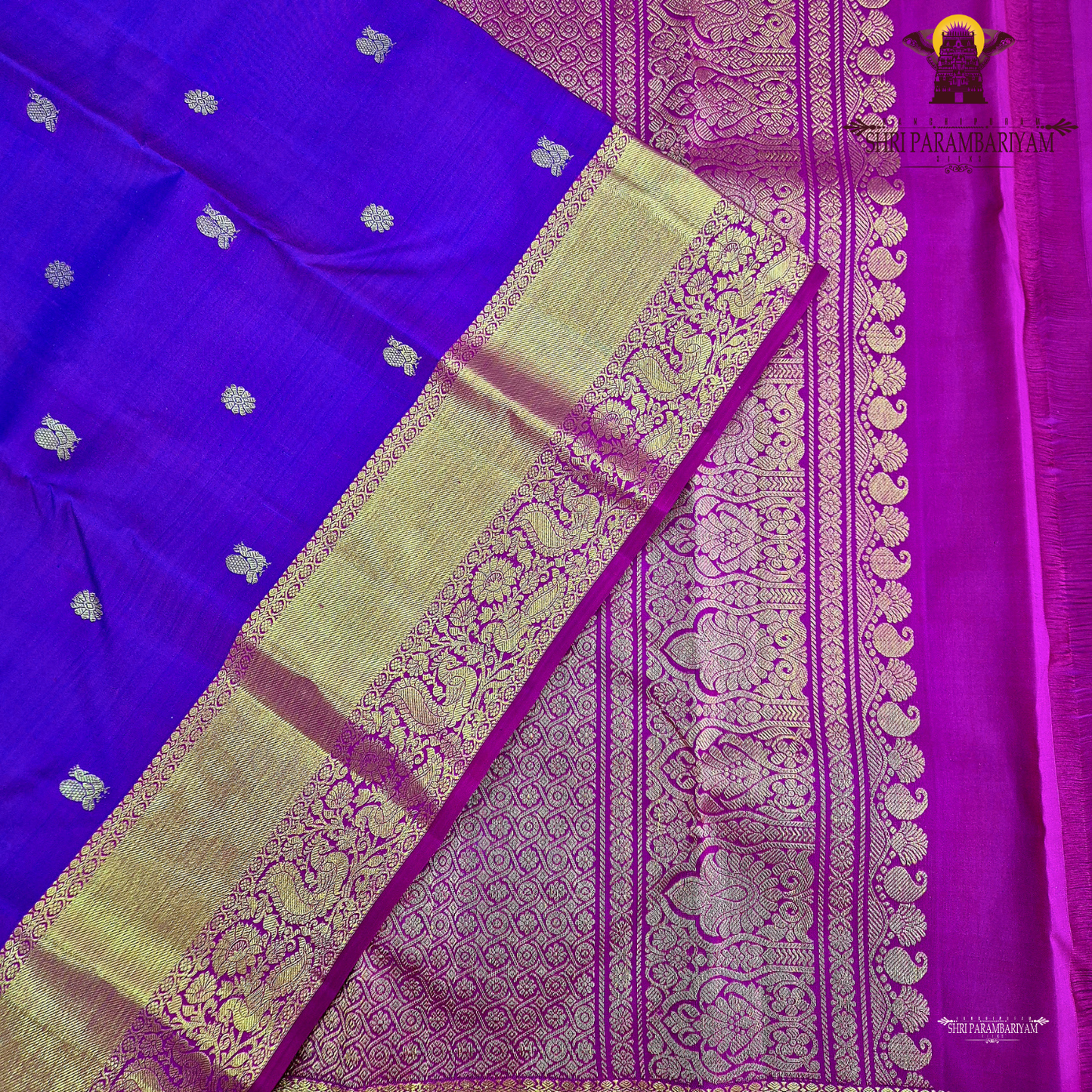 A rich Royal purple (violet) with a contrasting gold zari border Saree
