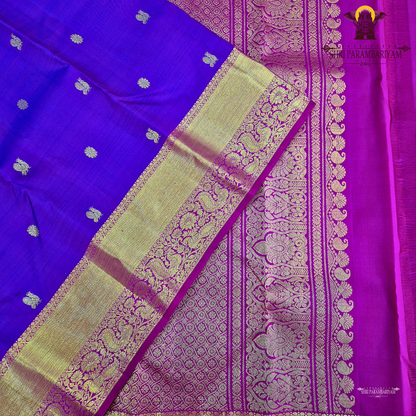 A rich Royal purple (violet) with a contrasting gold zari border Saree