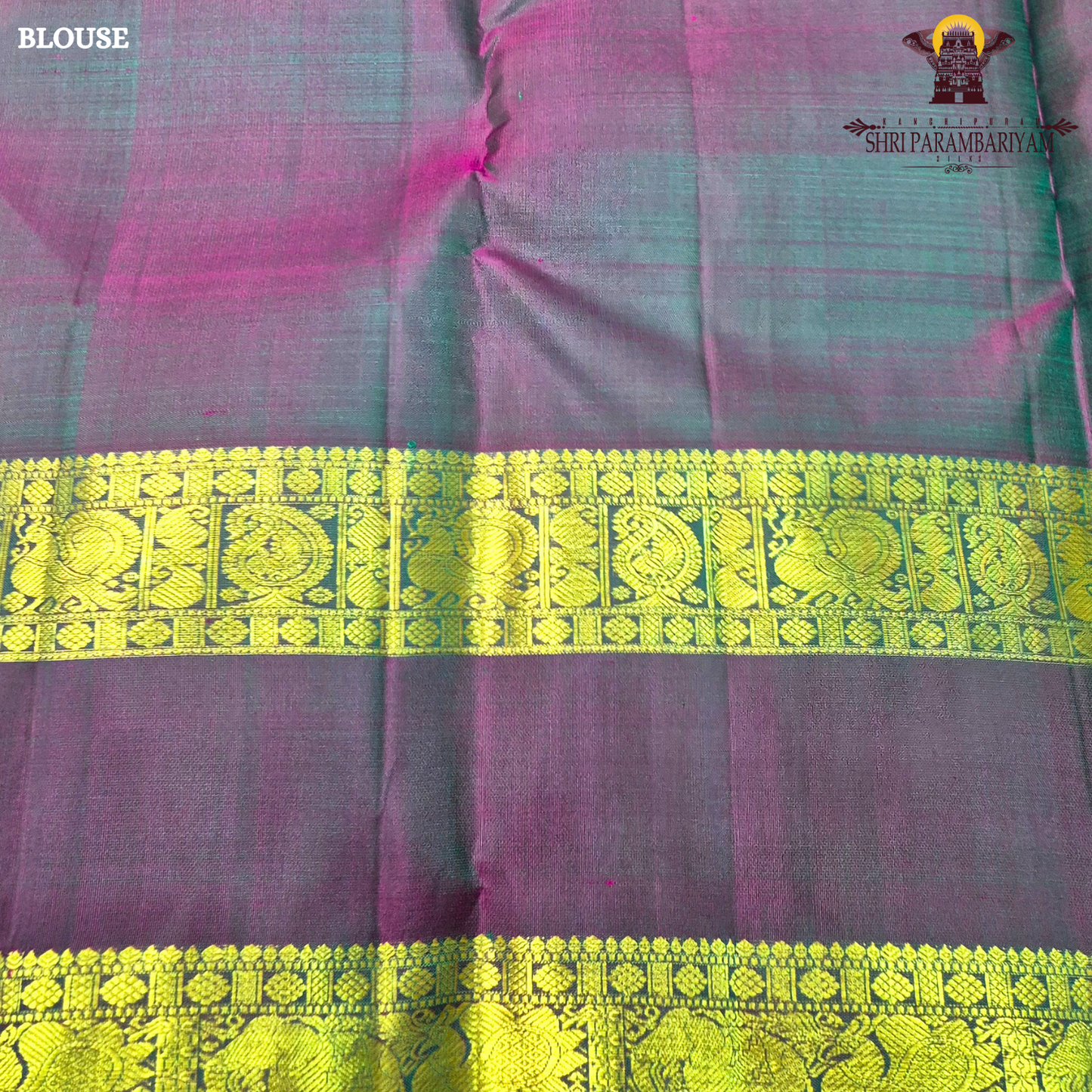 A turquoise Blue and Violet Purple with rich Gold Zari Saree