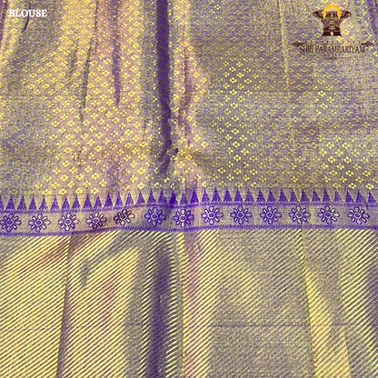 A rich Golden Tissue base with a soft Purple (Violet) border Saree