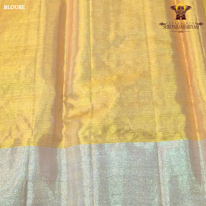 A delicate champagne gold with a subtle rose-gold tint Saree