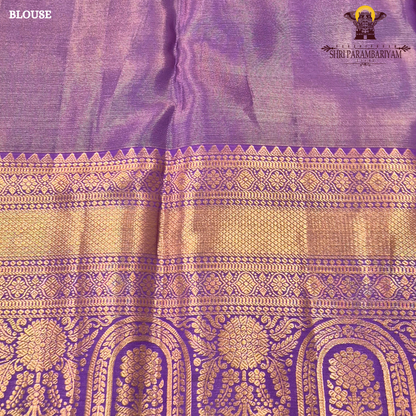 Soft lavender purple with rich gold zari and meenakari accents Saree