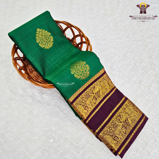 A rich Emerald Green with Royal Purple Border Saree