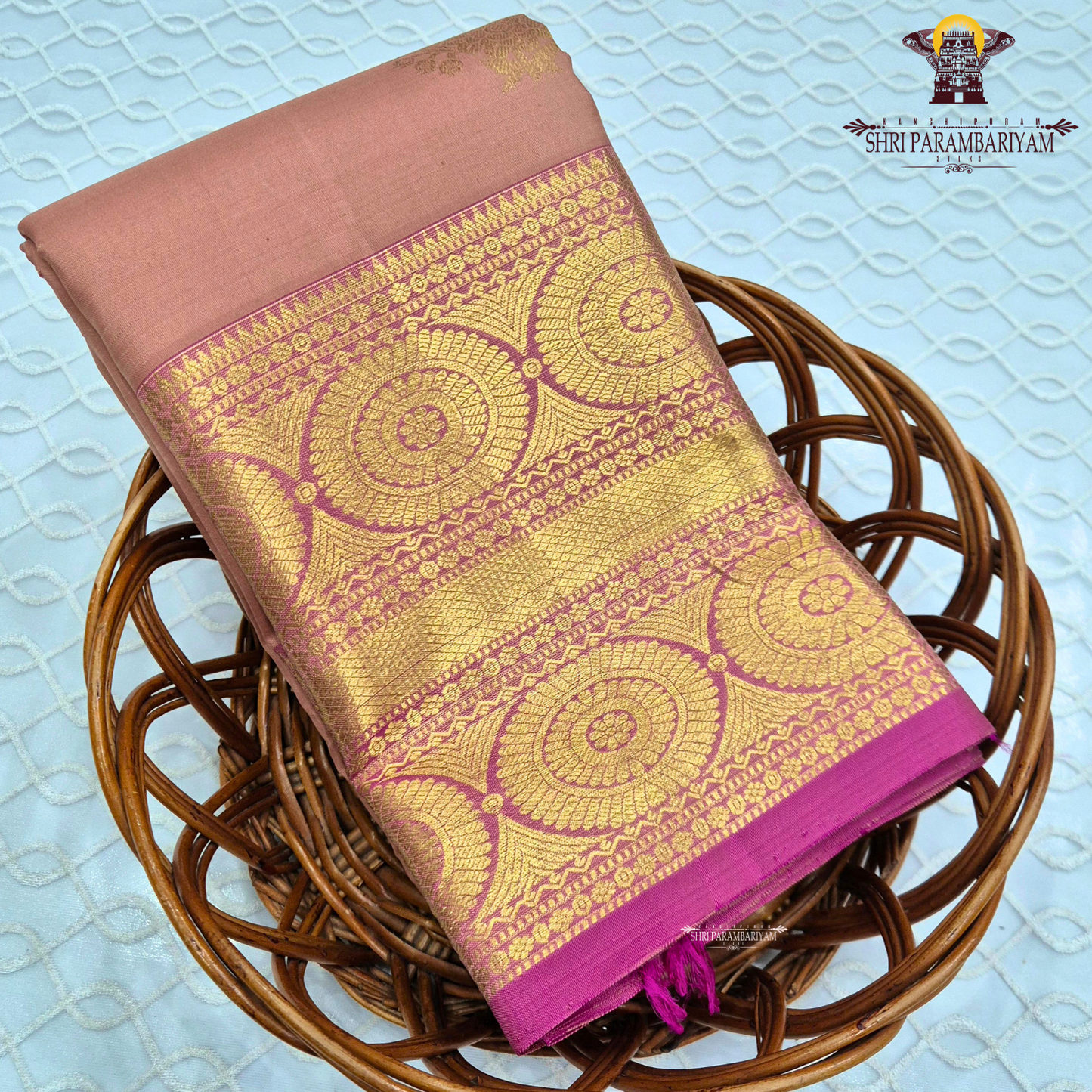 A dusty Rose Pink and Rani Pink with rich Gold Zari Saree