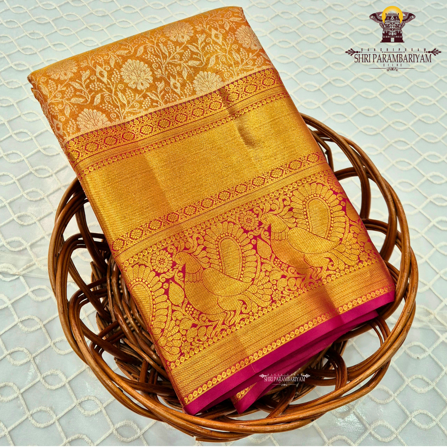 Rich mustard gold / honey gold with vibrant reddish-pink (rani pink) border Saree