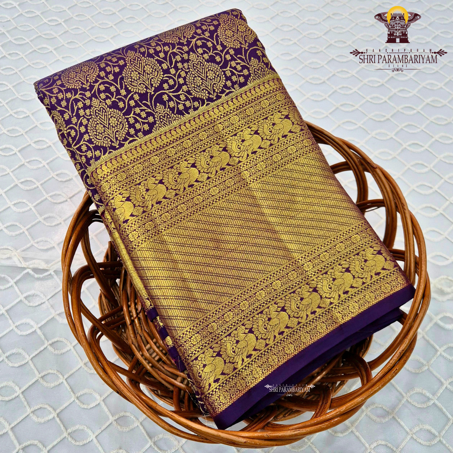 Rich deep purple shade with luxurious antique gold zari Saree