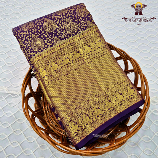 Rich deep purple shade with luxurious antique gold zari Saree
