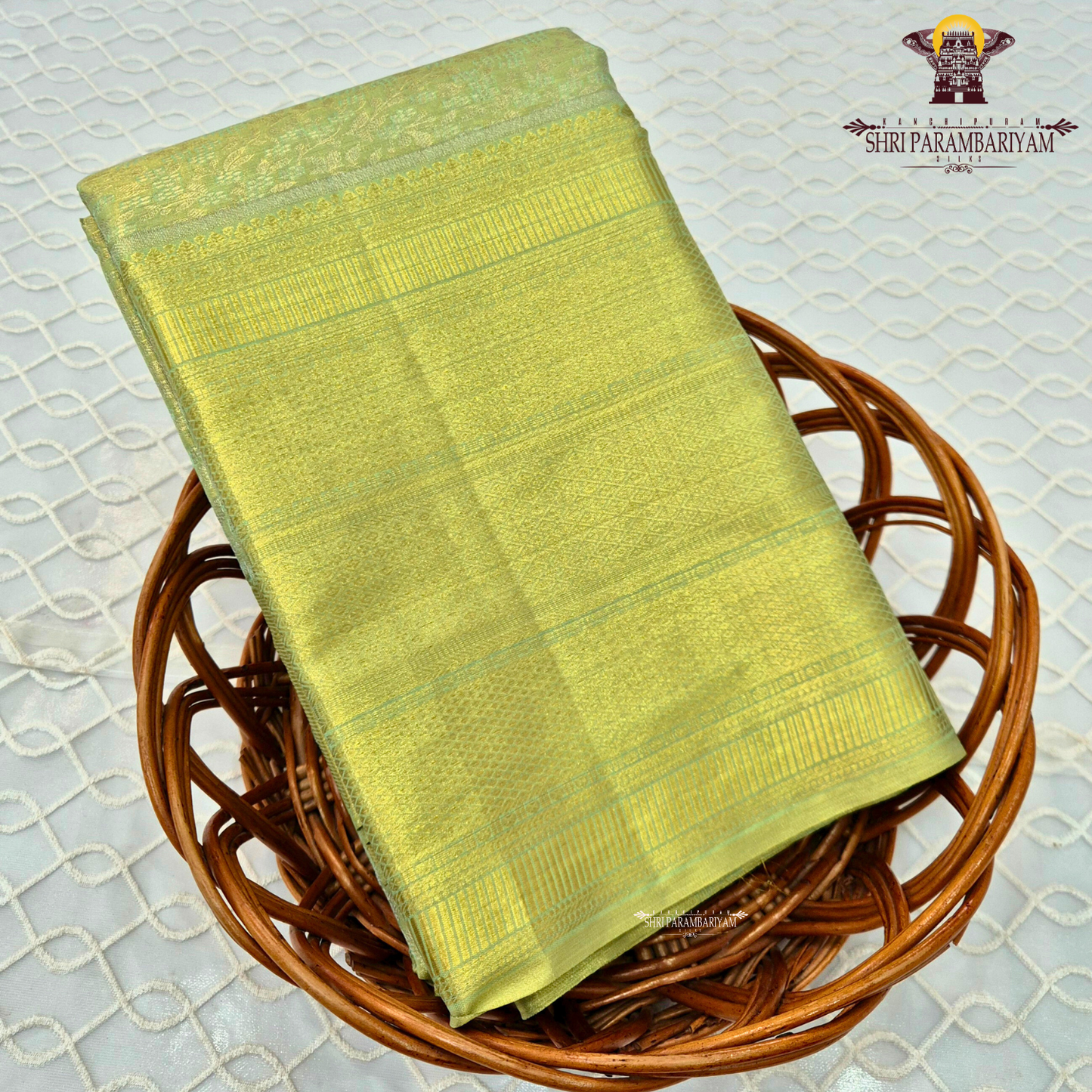 Elegant pastel pista green body with a subtle self-tone zari Saree