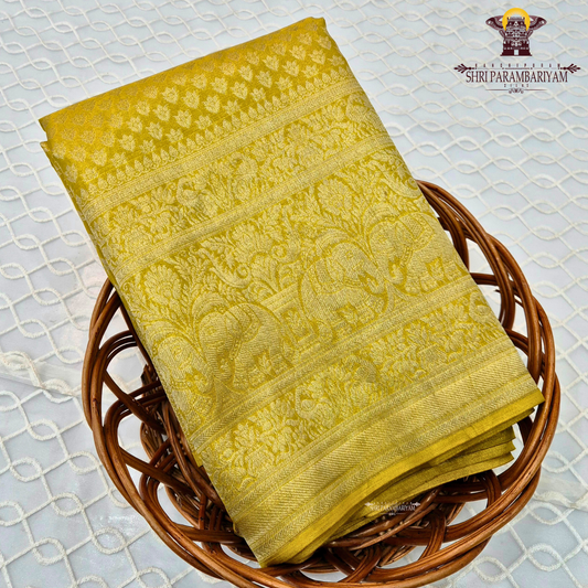 A rich mustard yellow shade with golden tones, giving it a bright and traditional Saree