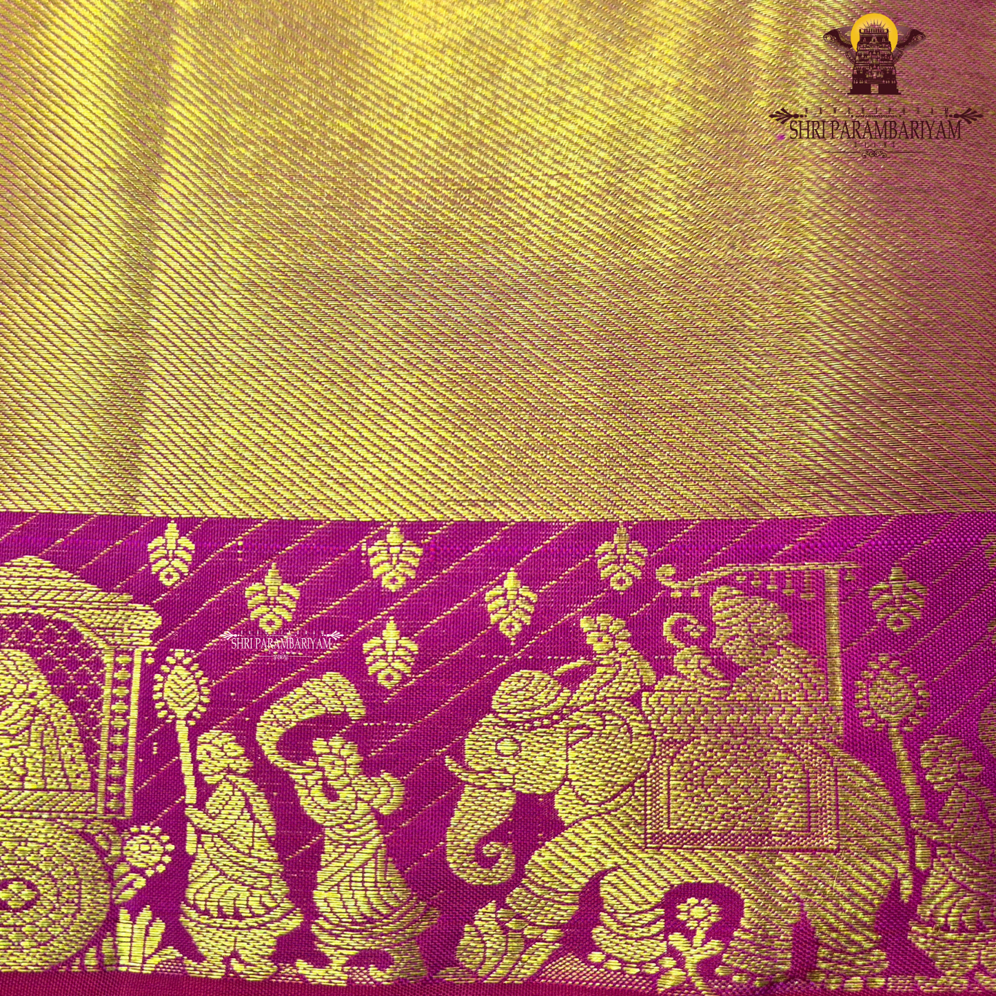 A bright Rani Pink with rich Gold zari Saree