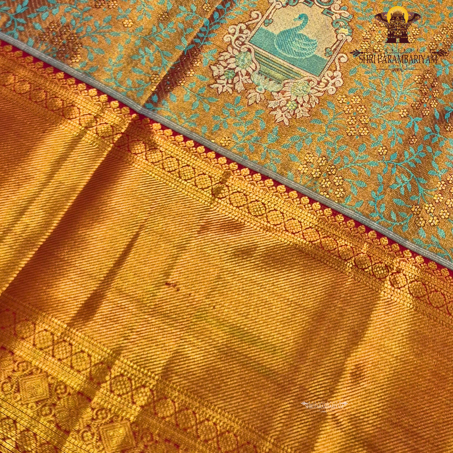 Rich dual-tone blend of antique gold and teal green Saree
