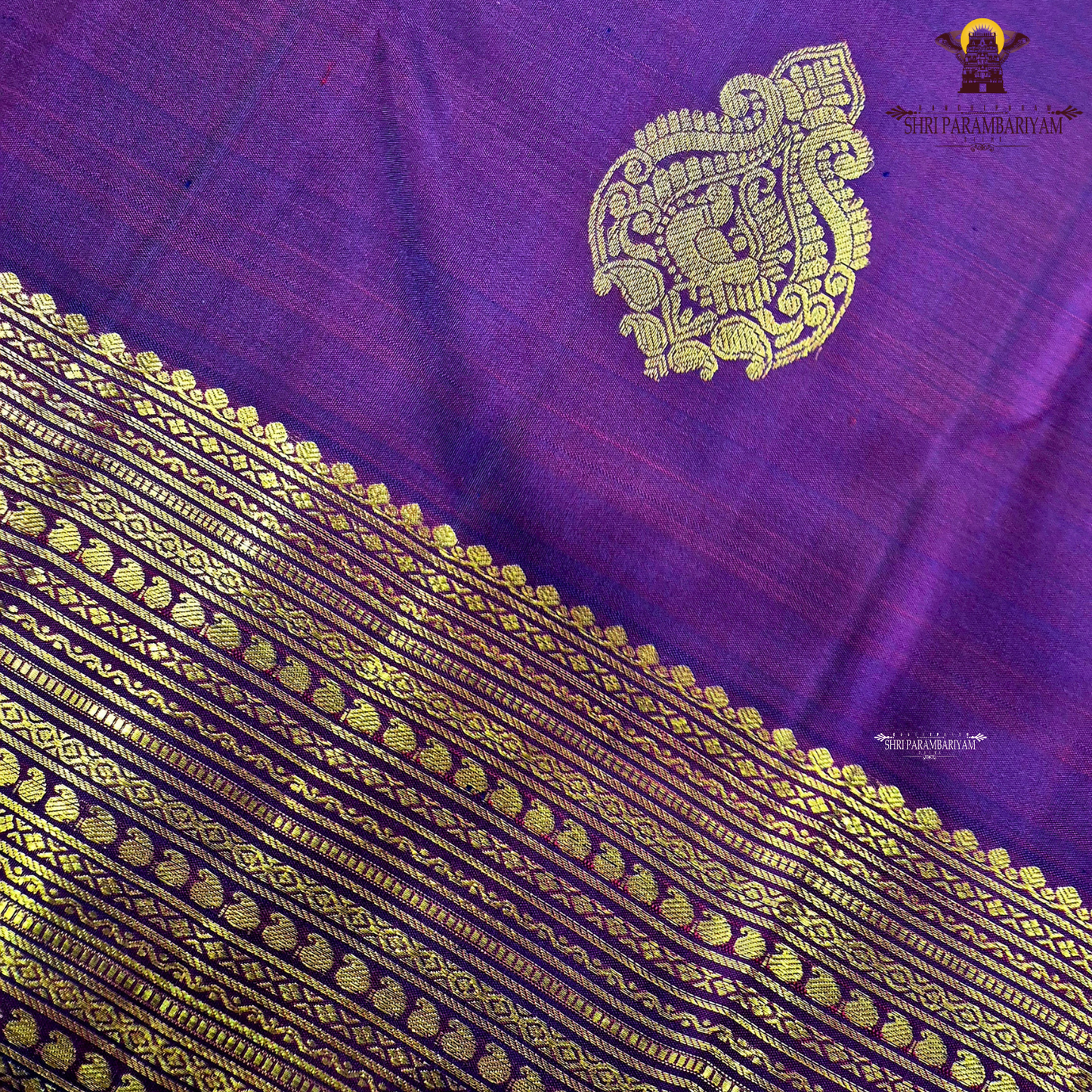 A deep Magenta Purple / Rani Purple with a rich dual-tone Saree