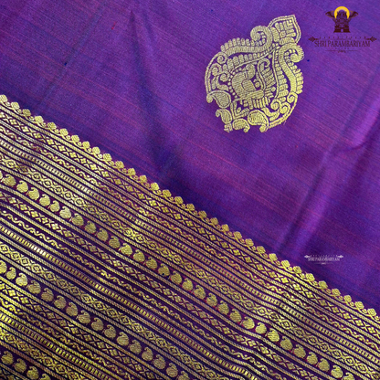 A deep Magenta Purple / Rani Purple with a rich dual-tone Saree