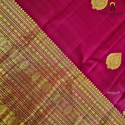 A rich Deep Maroon Red with exquisite gold zari weaving Saree