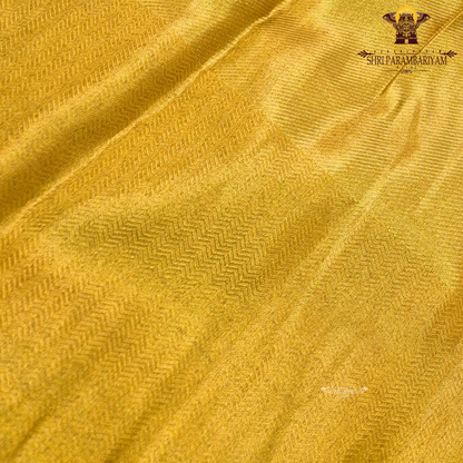 A rich mustard yellow (golden yellow) shade with a subtle shimmering Saree