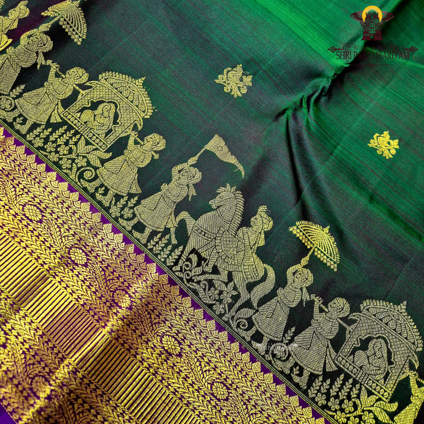 Deep bottle green body with a rich gold zari design Saree