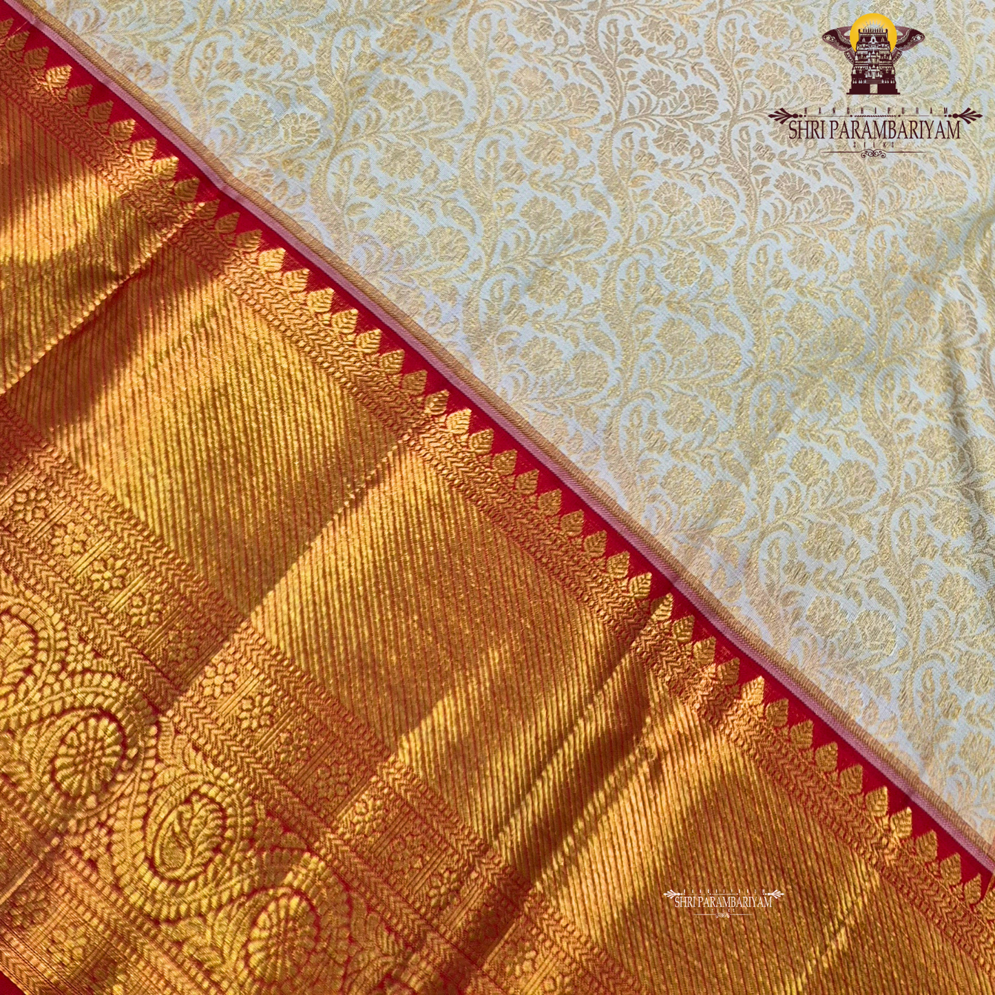 Elegant half white (off-white/ivory) body paired with a rich contrast red border Saree