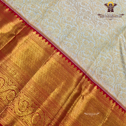 Elegant half white (off-white/ivory) body paired with a rich contrast red border Saree