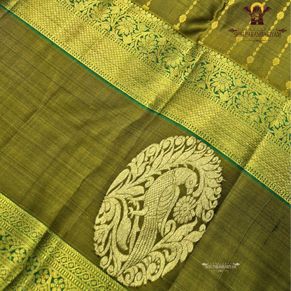 A rich olive green (mehendi green) shade, beautifully highlighted with intricate Saree