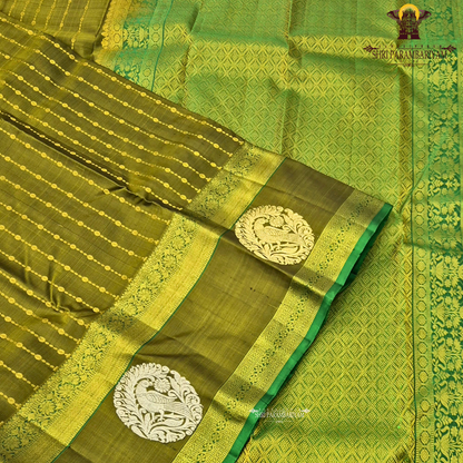 A rich olive green (mehendi green) shade, beautifully highlighted with intricate Saree