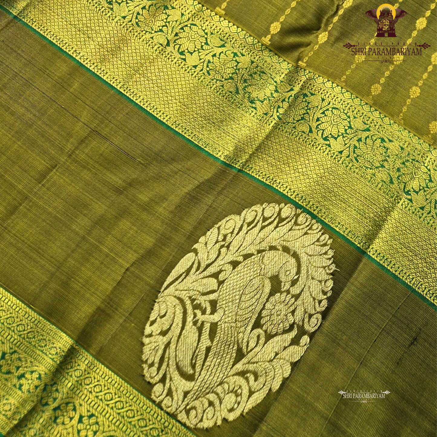 A rich olive green (mehendi green) shade, beautifully highlighted with intricate Saree