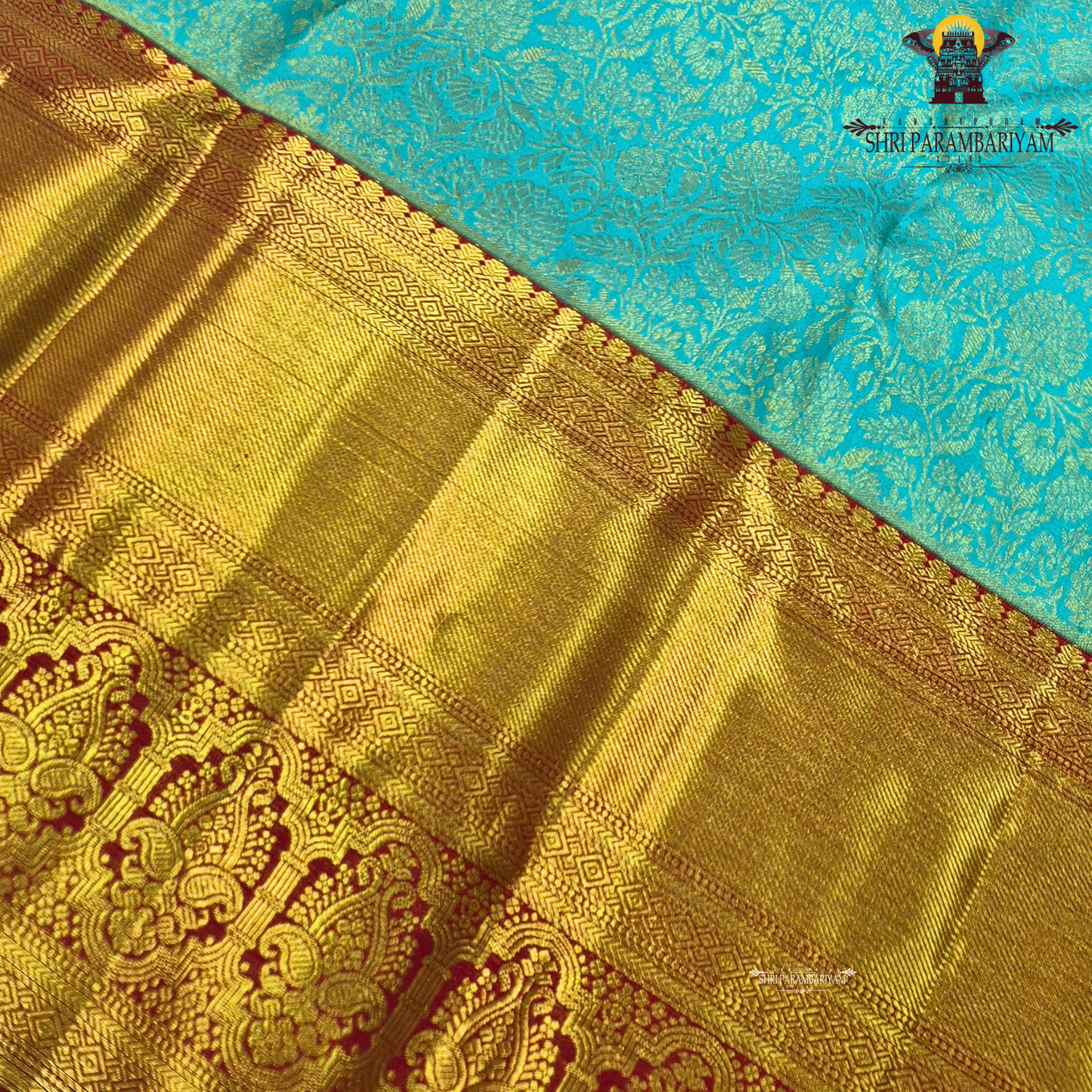 A beautiful aqua blue body with elegant floral zari weaving, paired with a rich golden Saree