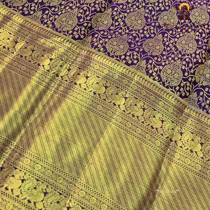 Rich deep purple shade with luxurious antique gold zari Saree