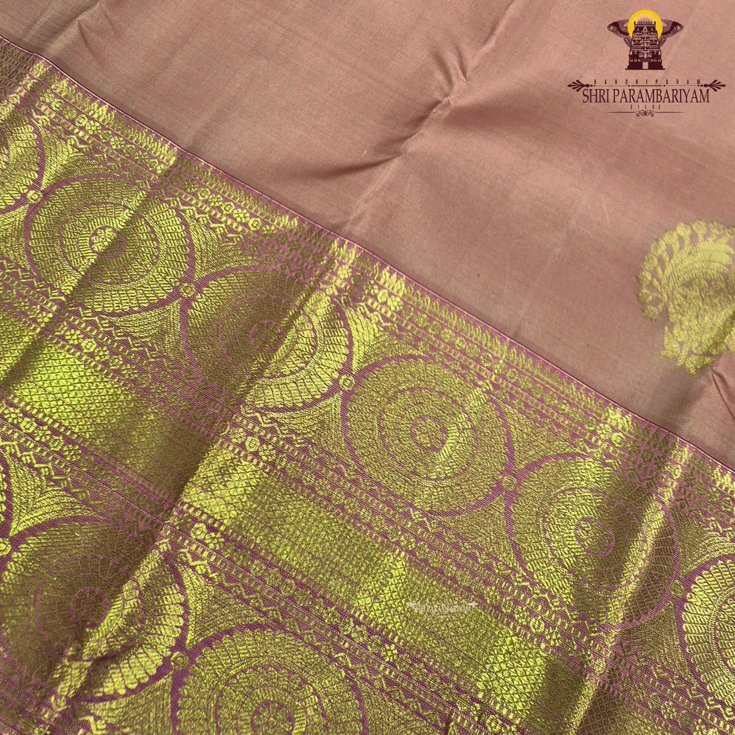 A dusty Rose Pink and Rani Pink with rich Gold Zari Saree