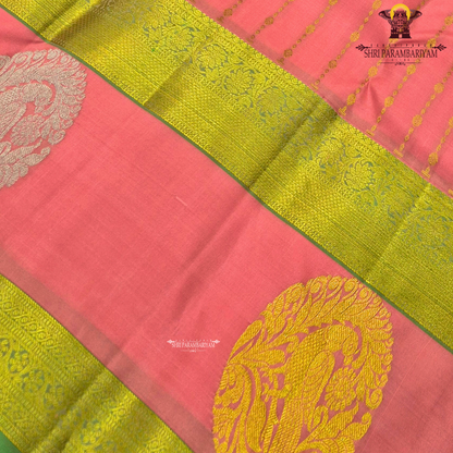 A beautiful coral pink (peach-pink) shade, elegantly enhanced Saree