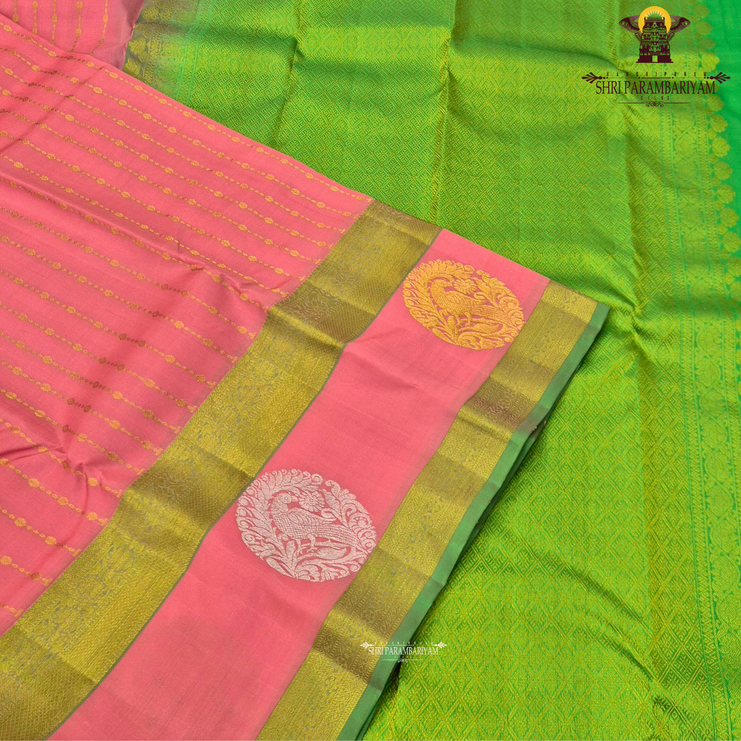 A beautiful coral pink (peach-pink) shade, elegantly enhanced Saree