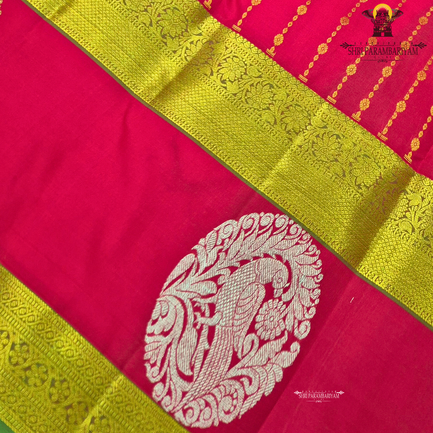 A vibrant Tomato red shade, radiating richness and festive elegance Saree