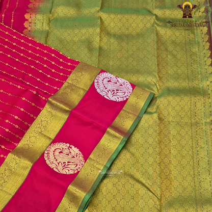 A vibrant Tomato red shade, radiating richness and festive elegance Saree