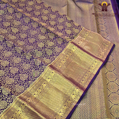 Rich deep purple shade with luxurious antique gold zari Saree