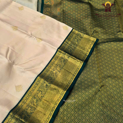 A soft and classic cream body adorned with a subtle Saree