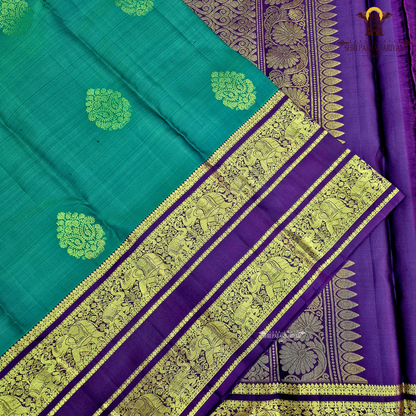 A rich Emerald Green with Royal Purple Border Saree