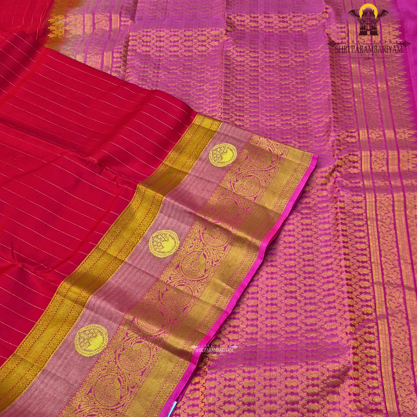 A vibrant reddish pink (vermilion red) body beautifully complemented Saree
