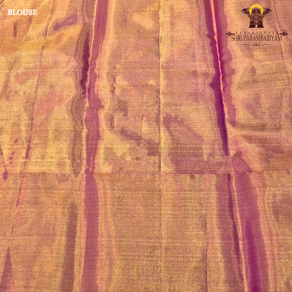 A shimmering copper-gold tissue base, giving the fabric a radiant and luxurious Saree