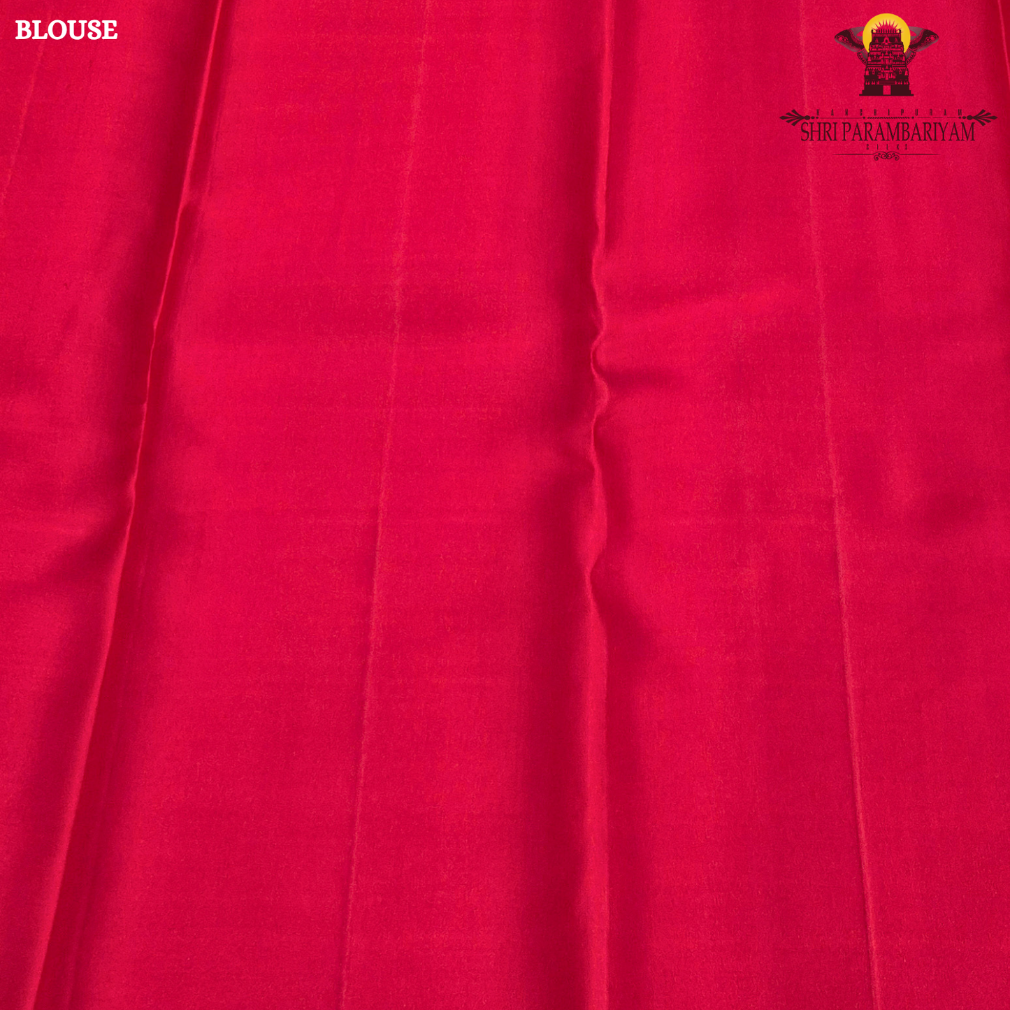 A vibrant bridal red color complemented by rich gold zari weaving Saree