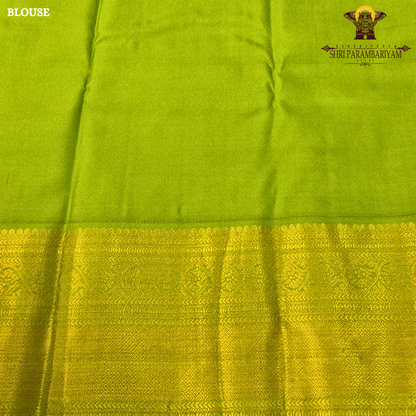 A stunning deep magenta (rani pink) and bright parrot green combination Saree