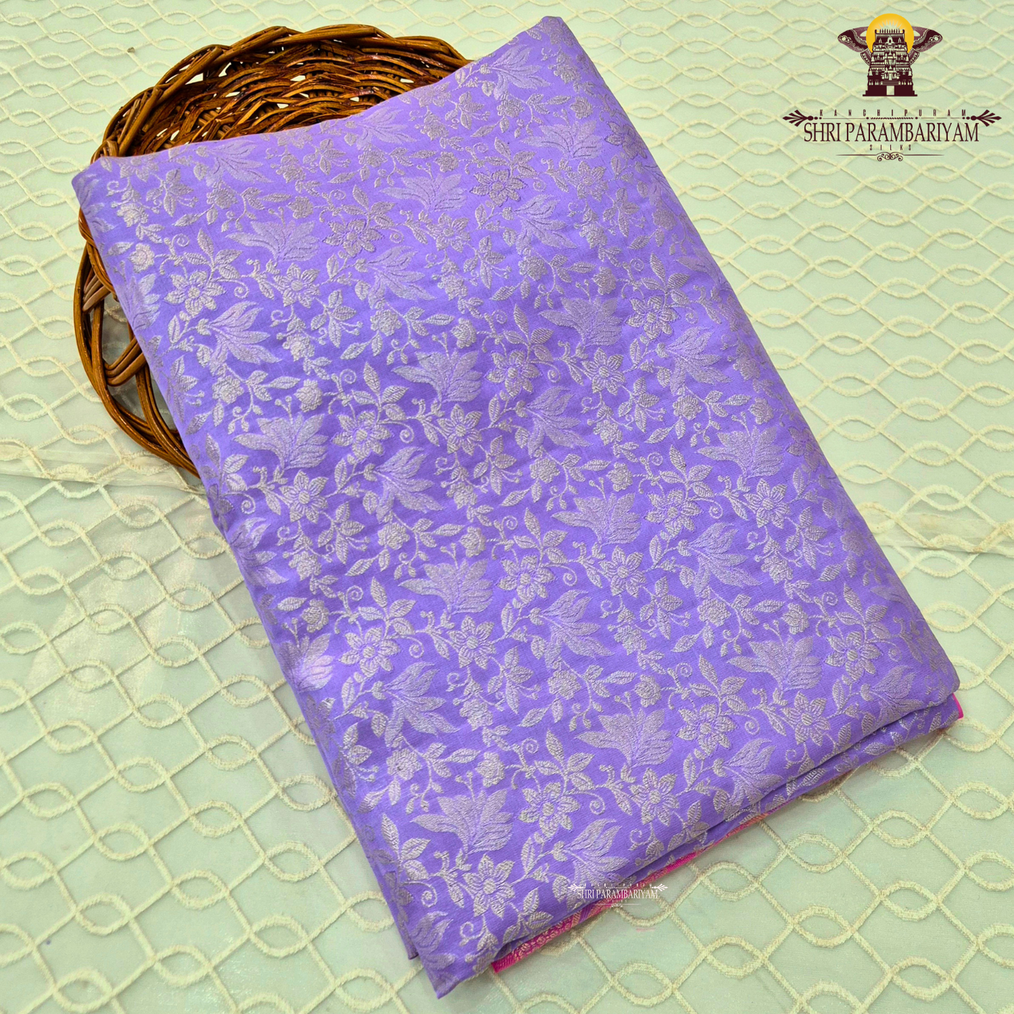 A rich lavender purple (soft violet tone) base with elegant silver zari work Saree