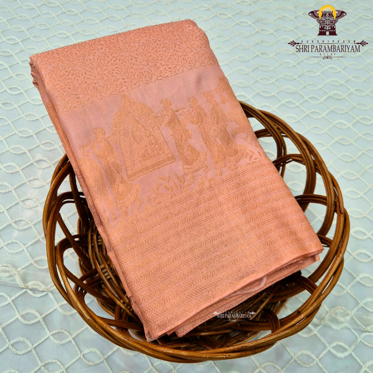 A soft peachy rose (muted bridal pink) shade with a warm undertone—an elegant Saree