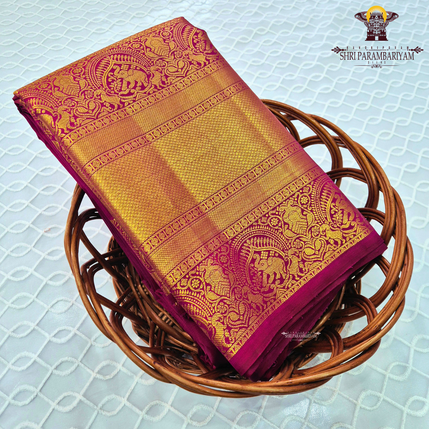 A rich Magenta / Rani Pink with Antique Gold Zari Saree