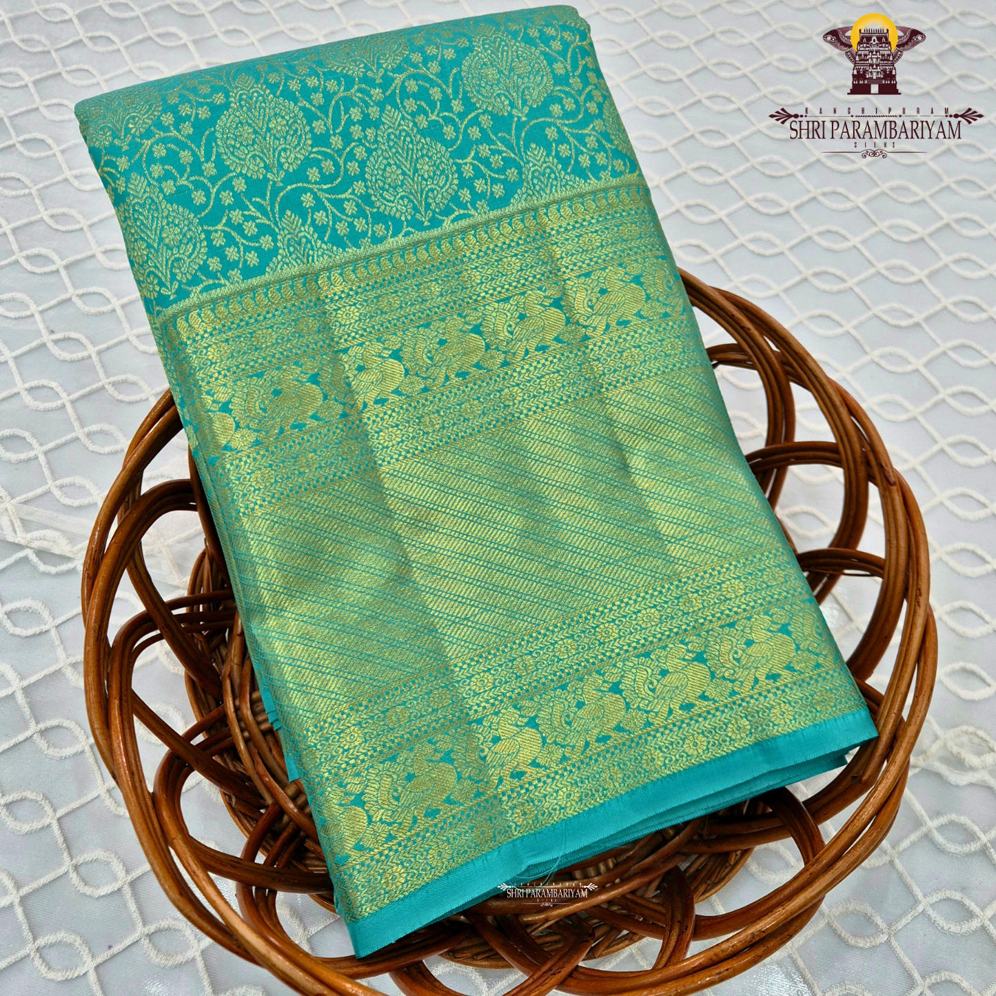 A beautiful turquoise blue shade with elegant self-gold zari Saree
