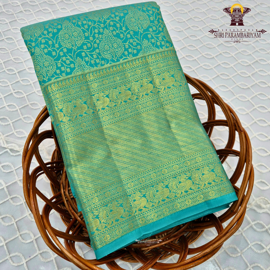 A beautiful turquoise blue shade with elegant self-gold zari Saree