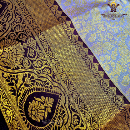 Rich lavender purple with an elegant gold zari sheen Saree