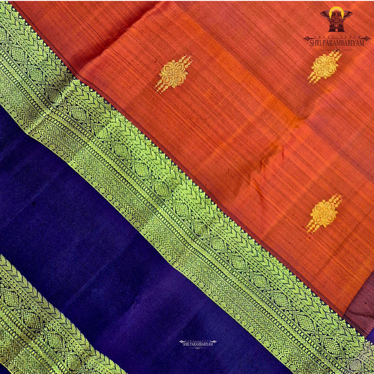 A rich Burnt Orange with Deep Aubergine Purple Border Saree